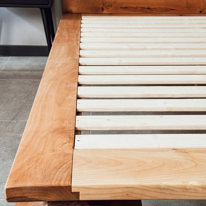 sleek-handmade-walnut-platform-bed-live-edge-headboard-spruce-detail-upphomestore