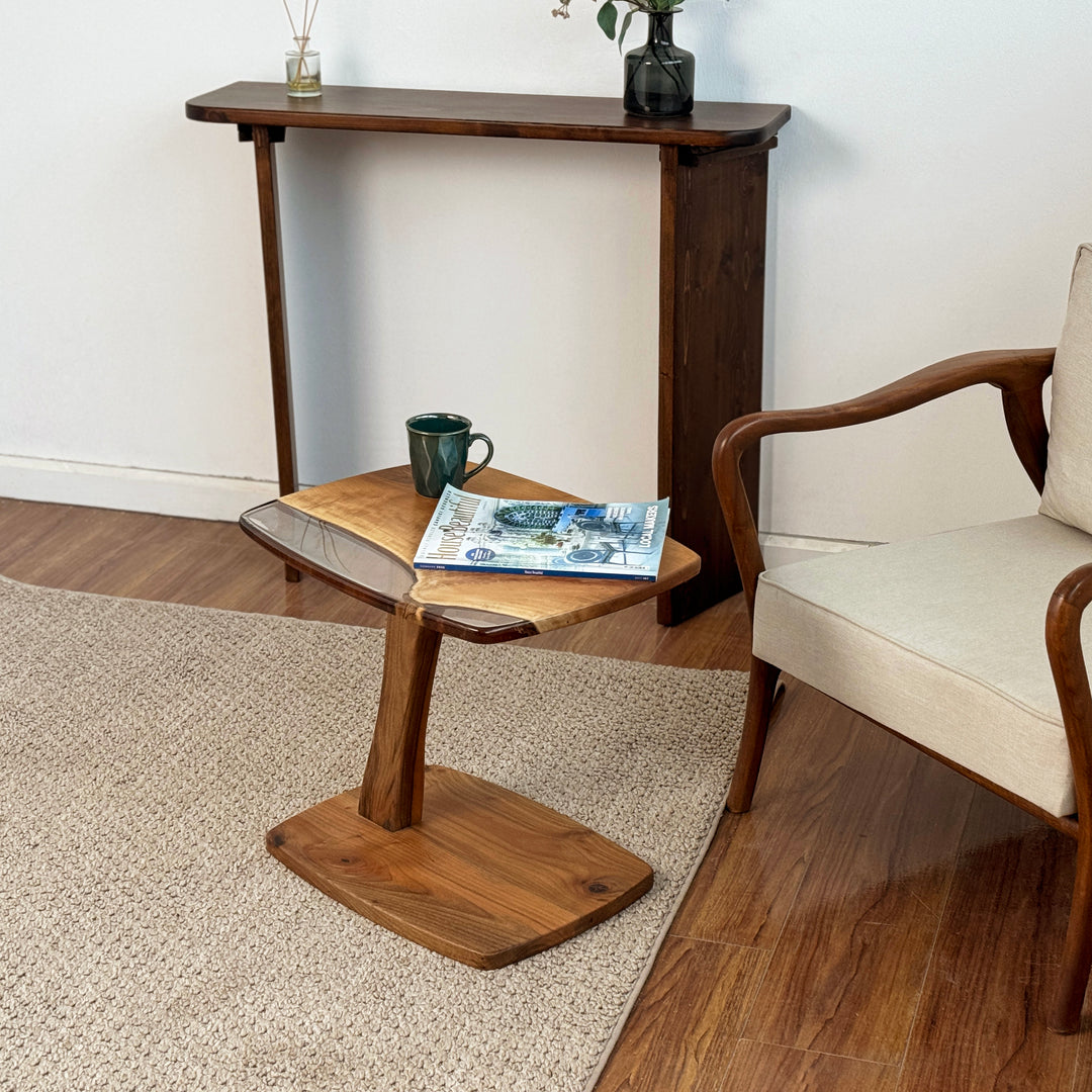 Clear epoxy detail on handmade walnut table surface
