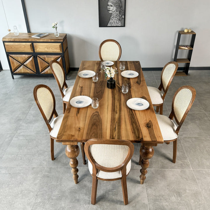 beautifully-styled-french-country-dining-room-with-a-rustic-walnut-farmhouse-table-and-classic-decor-upphomestore