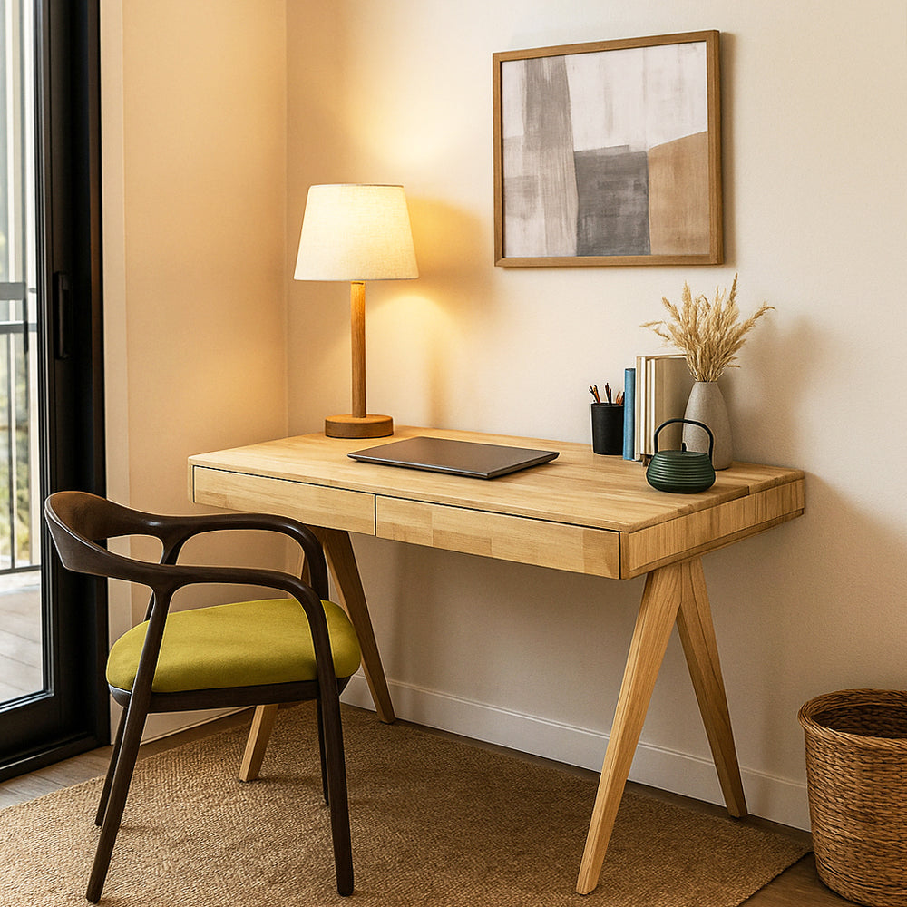 Wooden desk with chair, lamp, and decor in a home office setting