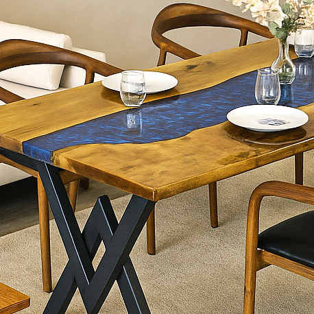 Handmade walnut farmhouse dining room table featuring stunning blue epoxy river