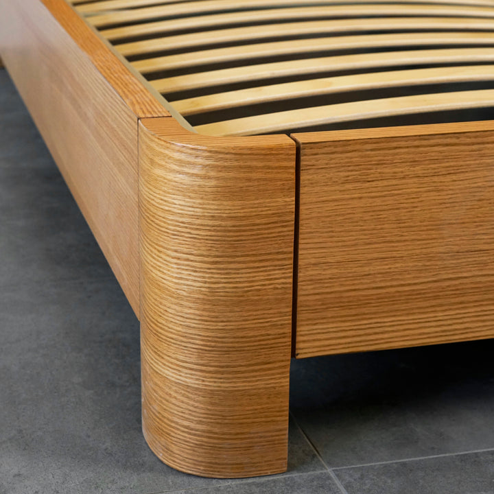 Handcrafted bed frame with under-bed storage and hydraulic mechanism