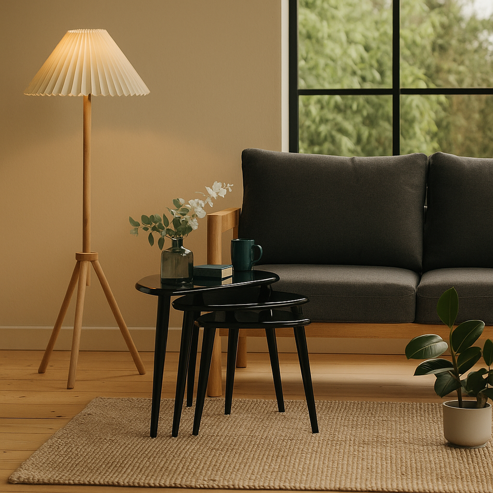 Living room with a gray sofa, floor lamp, and decorative items.