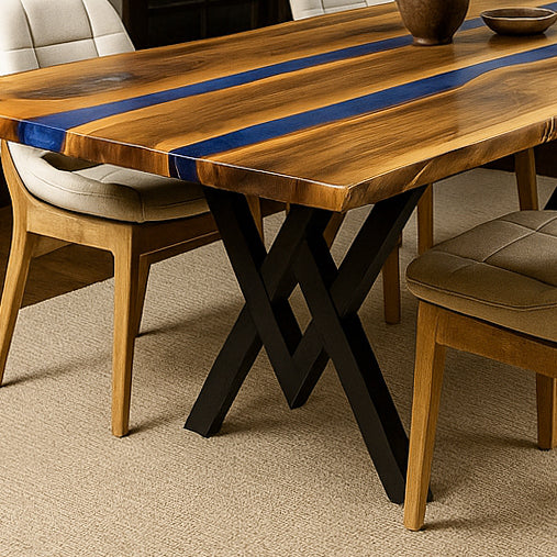 Wooden dining table with blue inlay and chairs on a beige carpet