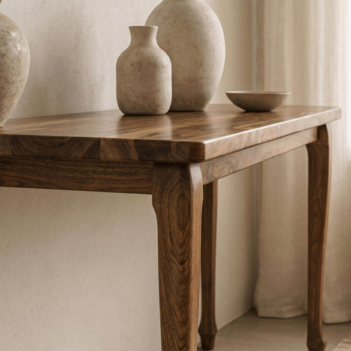 Sophisticated cabriole legged walnut console table combining traditional elegant leg curves with a sleek, clean tabletop.