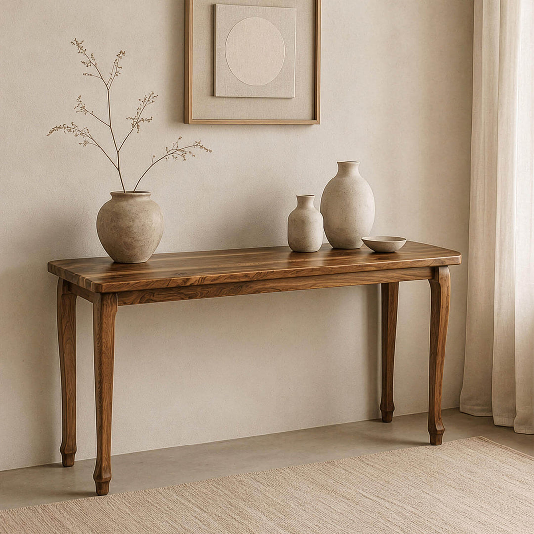 Artistic statement furniture piece: the cabriole legged walnut console table adding timeless warmth to a living space or entryway.
