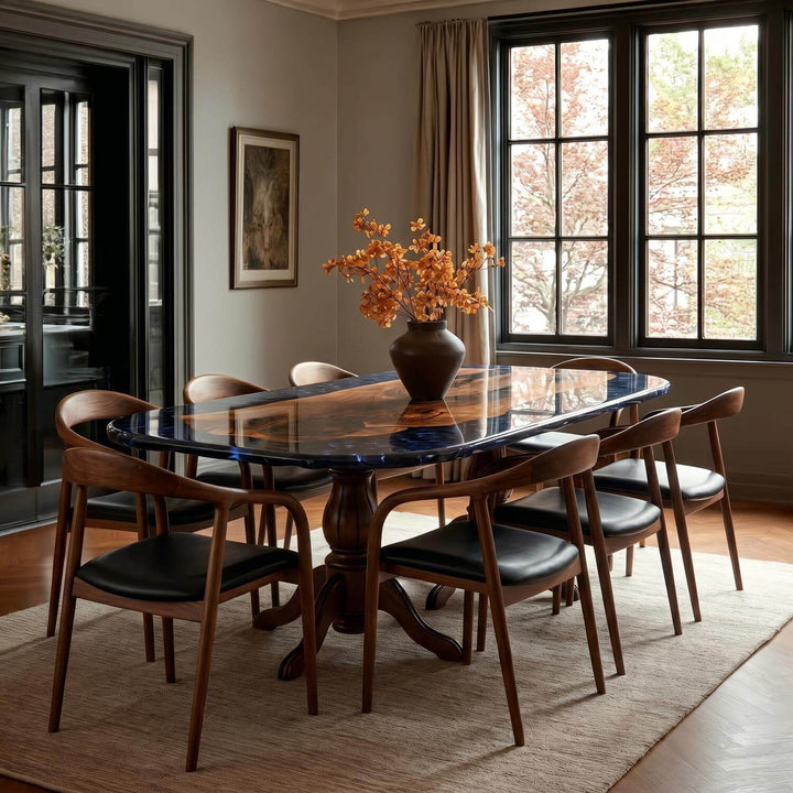Epoxy walnut table with a polished surface, rising above a centrally located carved classic leg design.