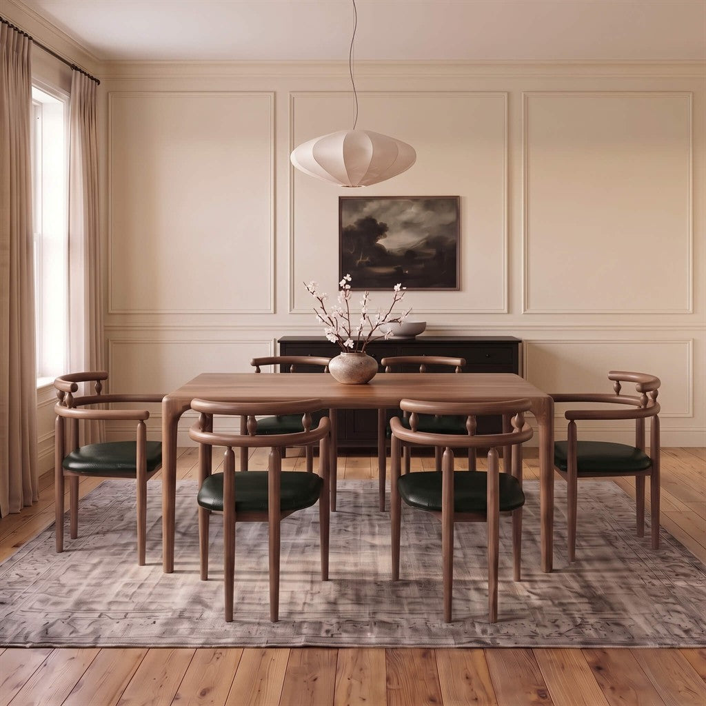 Mid-century modern style solid walnut dining chair with curved backrail and spindle supports   