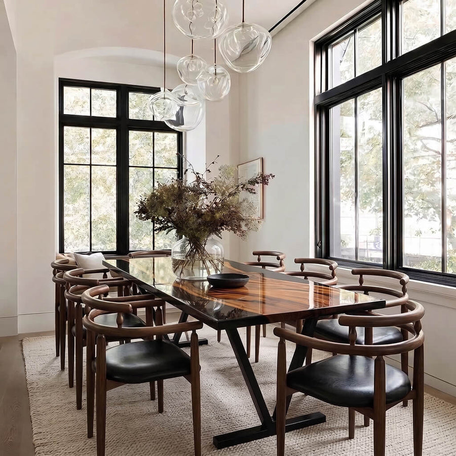 Geneva dining table featuring a flowing epoxy center stream and geometric metal legs
