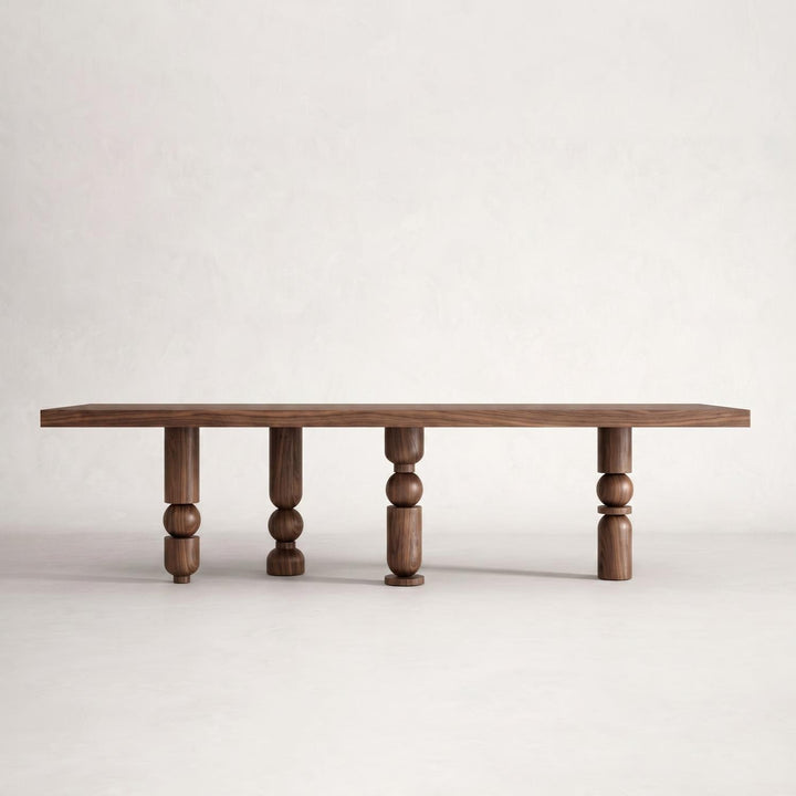 Architectural statement piece featuring the Postmodern Torna Ayaklı Ahşap Yemek Masası with structural sphere and cylinder leg motifs.