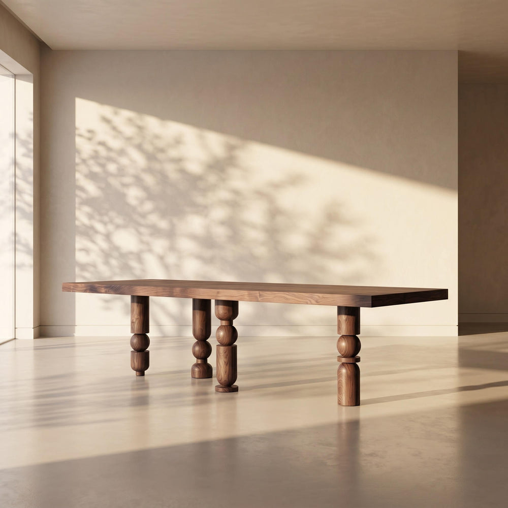 Elegant Postmodern Turned Dining Table highlighted by the play of light and organic shadows on the background.