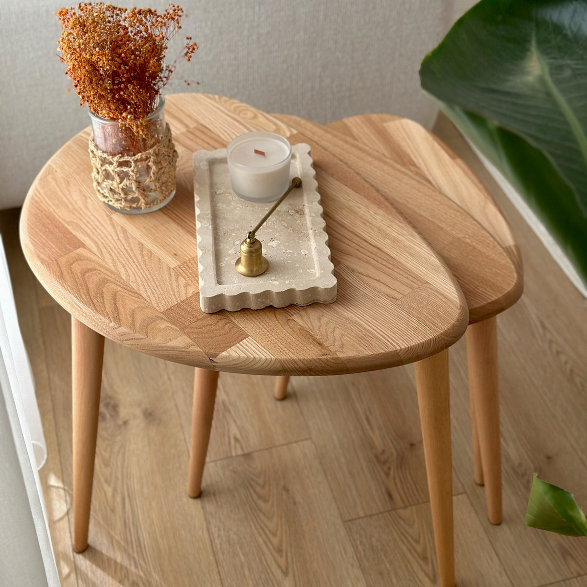 Top view of chestnut nesting tables in Transparent-Chestnut color with joined wood strips on the top