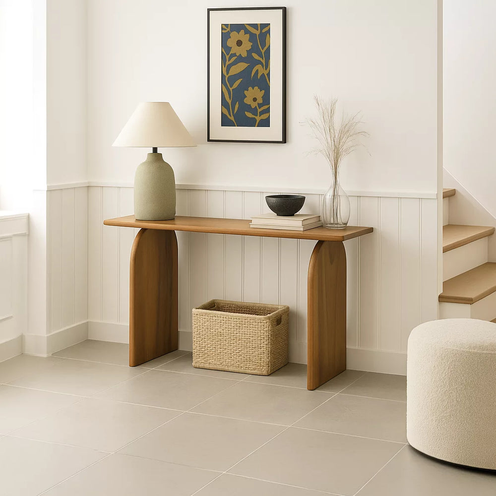 A minimalist white wall highlights a beautifully designed Japandi console table.