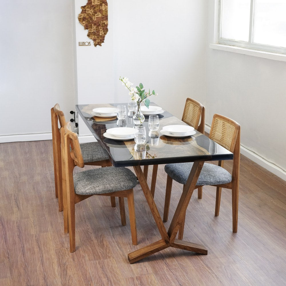 Black epoxy walnut live edge dining table from the left corner with the wooden Y shaped foot