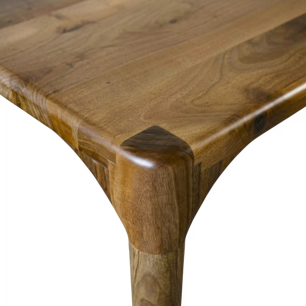  Oslo Solid Walnut Dining Table featuring a modern Scandinavian design with a sleek, curved wooden top.