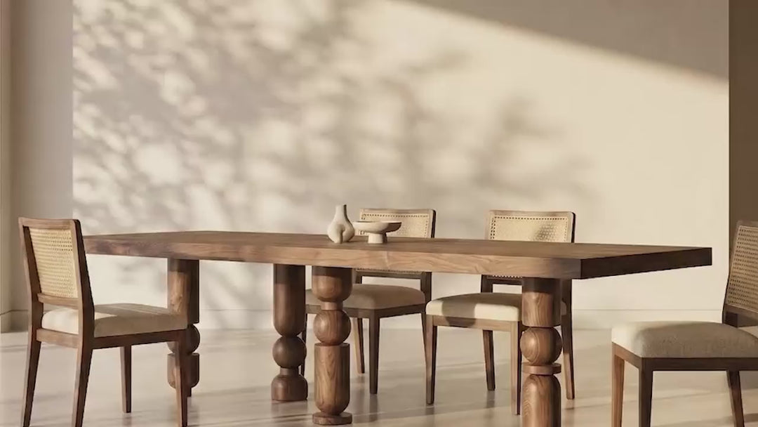 Sculptural avant-garde design meets functional craftsmanship in the Postmodern Turned Wood Dining Table.