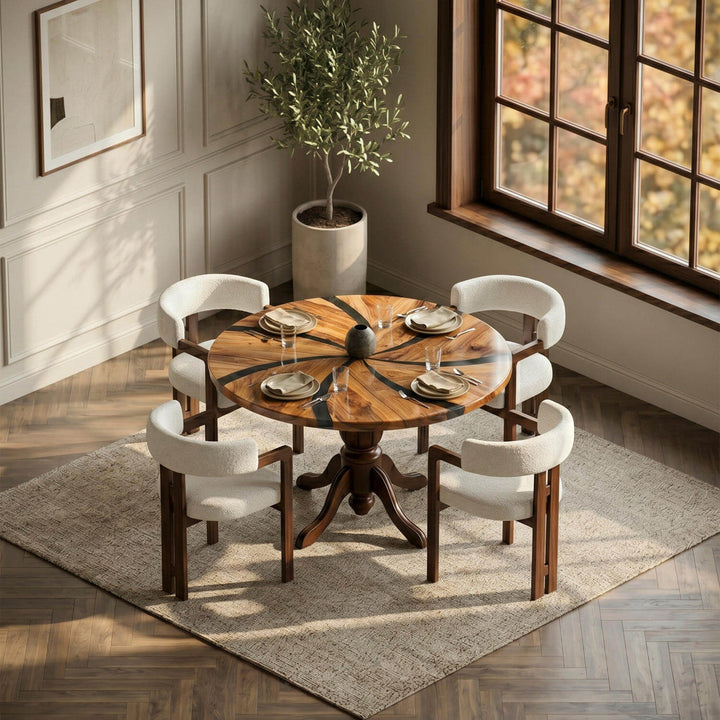 A unique round table design combining the propeller-patterned arrangement of natural wood grains with traditional turned leg craftsmanship on the body.