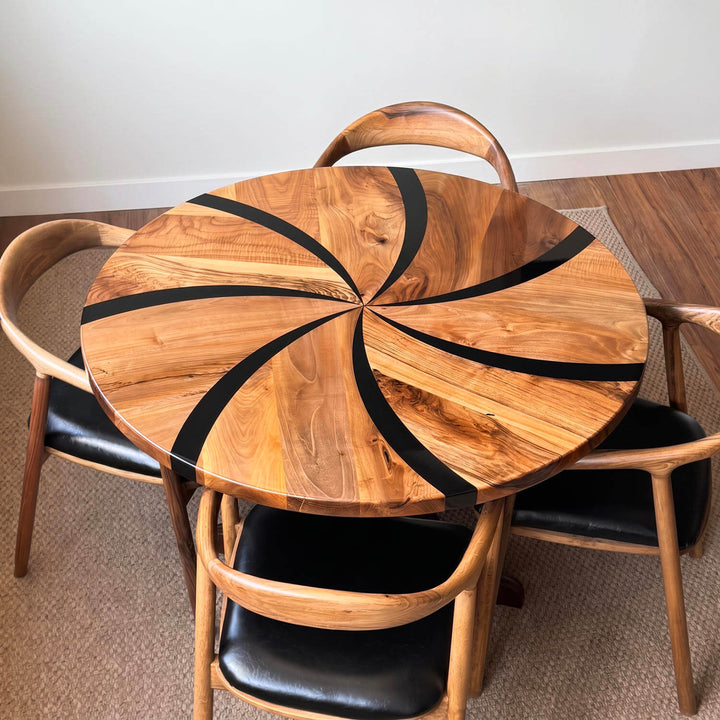 Bringing together classic craftsmanship and modern touches, the turned leg wooden dining table offers an elegant dining room decoration with its propeller-patterned surface.