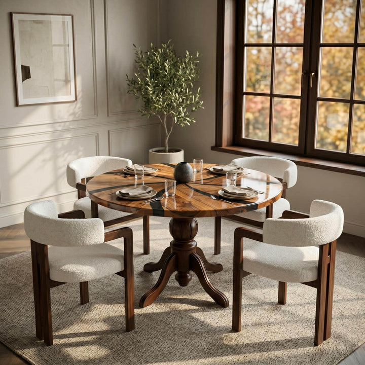 A luxury round table drawing attention with its propeller-patterned wood texture radiating from the center and the aesthetic turned leg details at the base.