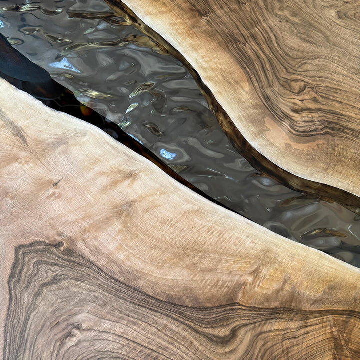 Handcrafted Silverrill dining table serving as a focal point in a sunlit dining area
