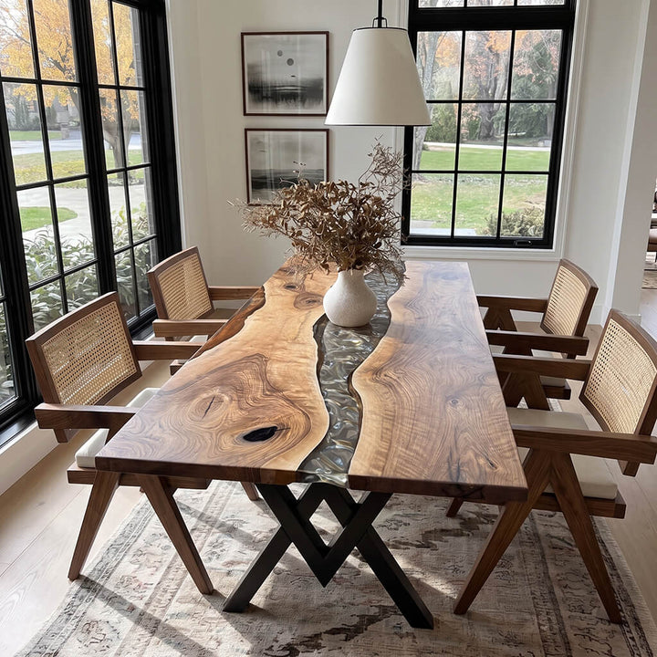 Silverrill dining table featuring a flowing river design center and modern geometric base structure