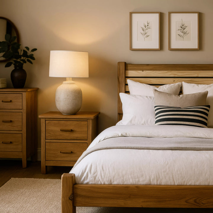 A wooden Scandinavian bed frame with a sleek design, emphasizing simplicity and natural materials in its construction.