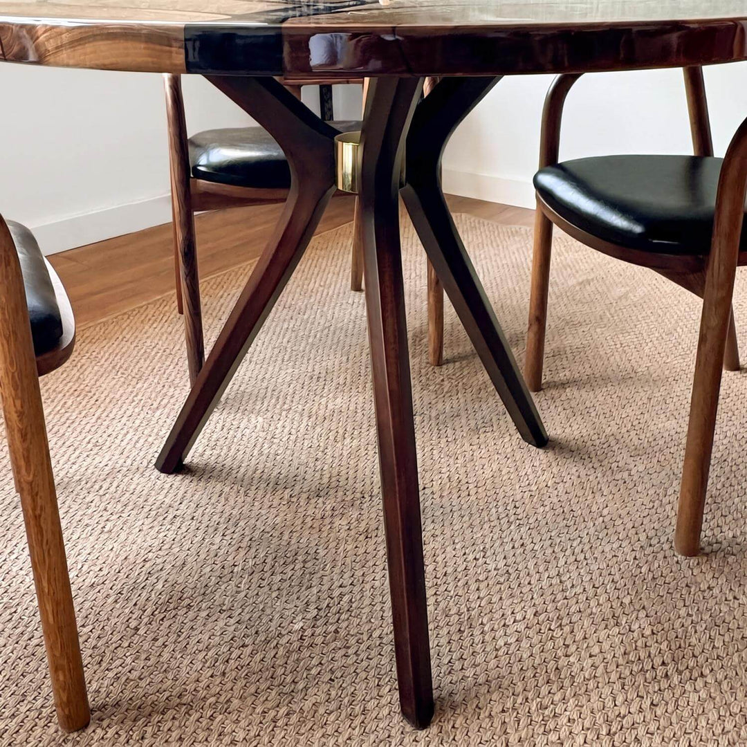 A timeless furniture piece blending rustic nature-inspired motifs with modern design: the durable tree pattern walnut table.