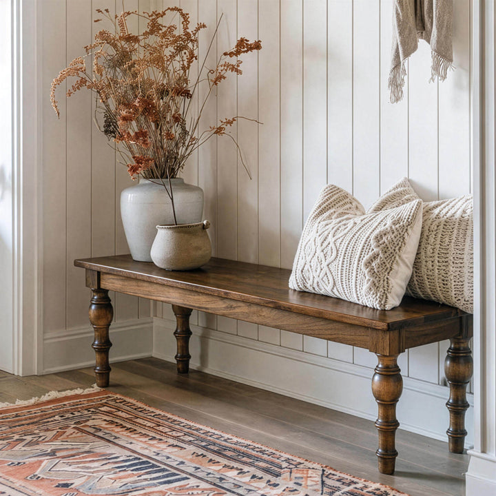 Traditional turned leg wooden bench blending rustic charm with architectural carved leg profiles.