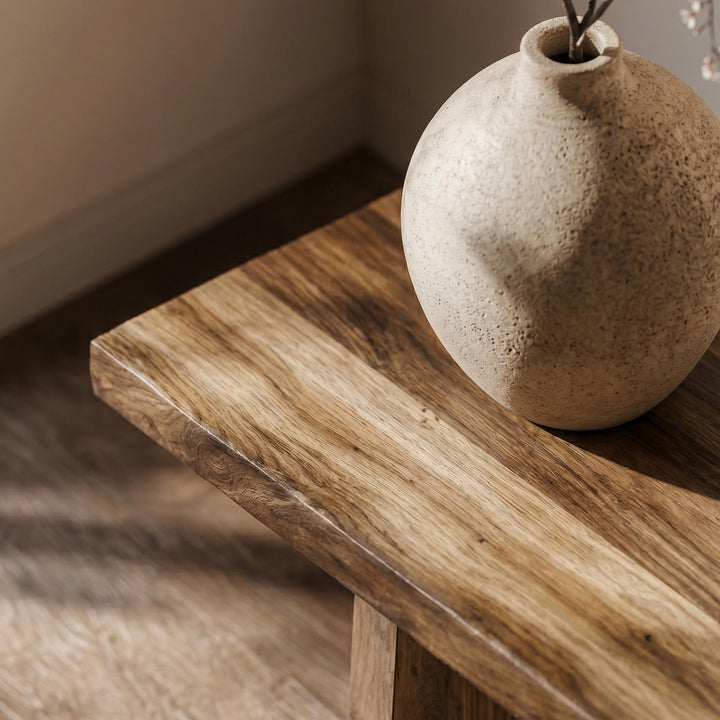 Minimalist and rustic-inspired walnut wood bench offering an elegant seating solution for entryways or living rooms.