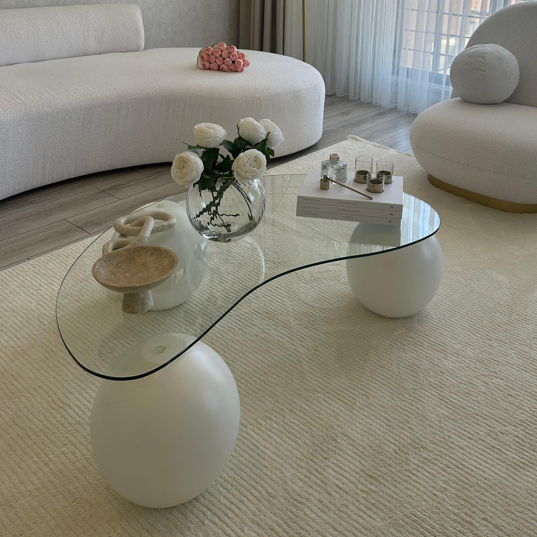 Bean Shaped Glass Top Coffee Table With Wooden Ball Legs - White