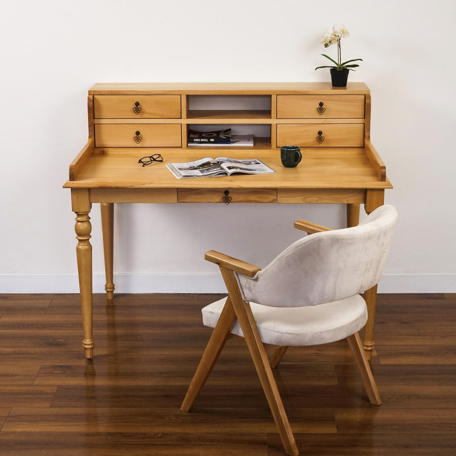 Solid beech writing desk with a drawer hutch and turned legs, front view with an upholstered chair